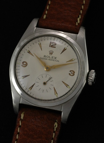 The original and rare ROLEX SUPER OYSTER non-screw down winding crown is 